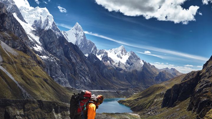 Hiker in the Cordillera Huayhuash alpine landscape - Huayhuash Circuit, Peru
