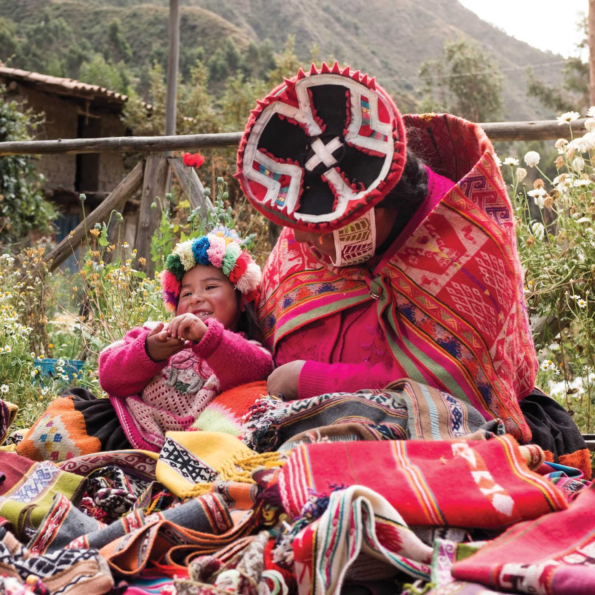 The women of Huilloc are very happy for you to purchase some of their handcrafted weaving products | Mark Tipple