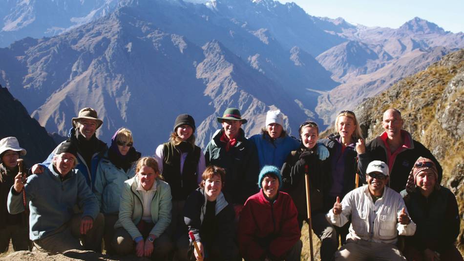 Enjoying the views after crossing Warmihuañusca, the highest pass on the Inca Trail | Nigel Leadbitter