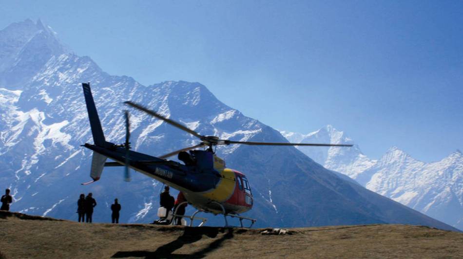 Our helicopter poised to transport travellers back to Kathmandu | Stephanie Pirrie