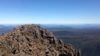 Barn Bluff Summit Panorama  The spectacular view from the top of Barn Bluff. Fitter walkers may have a chance to summit this iconic peak on a camping based walk of the Overland Track in Tasmania.  ------------------ Inspired? See More!  Our website: https://www.tasmanianexpeditions.com.au/ Instagram: https://www.instagram.com/tasmanianexpeditions/ Facebook: https://facebook.com/TasmanianExpeditions/ Twitter: https://twitter.com/tasexp