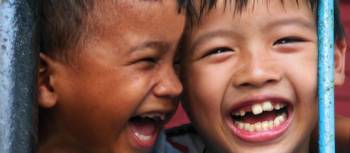 Cambodian children enjoying a laugh | Hans Kuoni