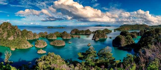 Relax into the tropical paradise of Raja Ampat.