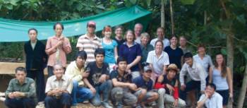 A happy group of travellers at the Seuang River Project in Laos | Seuang River Experience