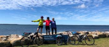 Cyclists at the end of the South Coast Cycle in Huskisson | Kate Baker