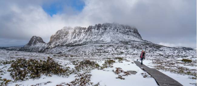 Hiker on the Overland Track in winter | Luke Tscharke