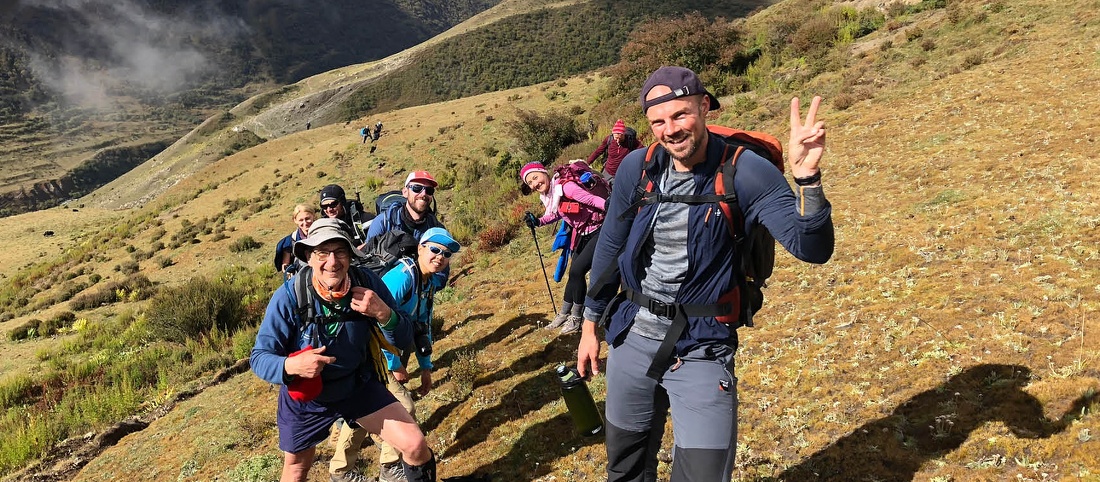 Group of happy hiker friends trekking as part of healthy lifestyle