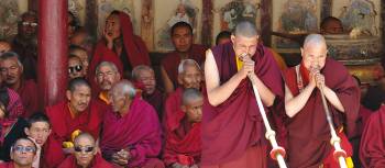 Gathered men at the festival at Hemis, Ladakh | Adam Mussolum