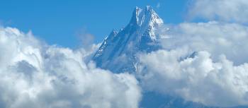 Machapuchare peaking through the clouds | Andrew Dixon / Bardo Imber-Dixon