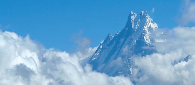 Machapuchare peaking through the clouds | Andrew Dixon / Bardo Imber-Dixon