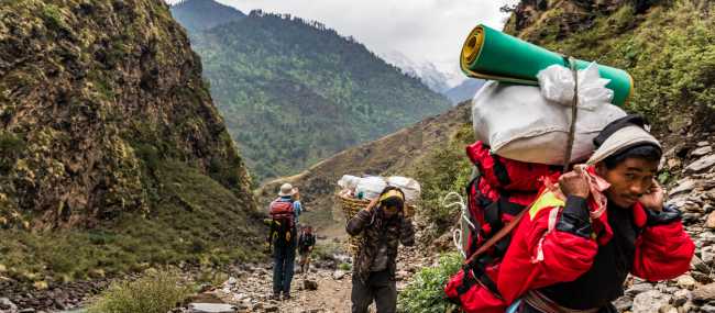 Porters at work in western Nepal | Lachlan Gardiner