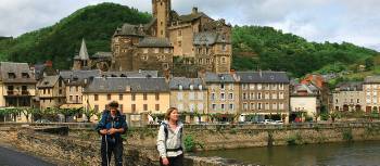 Hikers leaving Estaing on the Way of St James